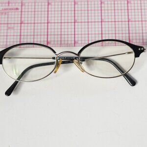 Vintage Vogue grandpacore retro black and silvertone glasses made in Italy
